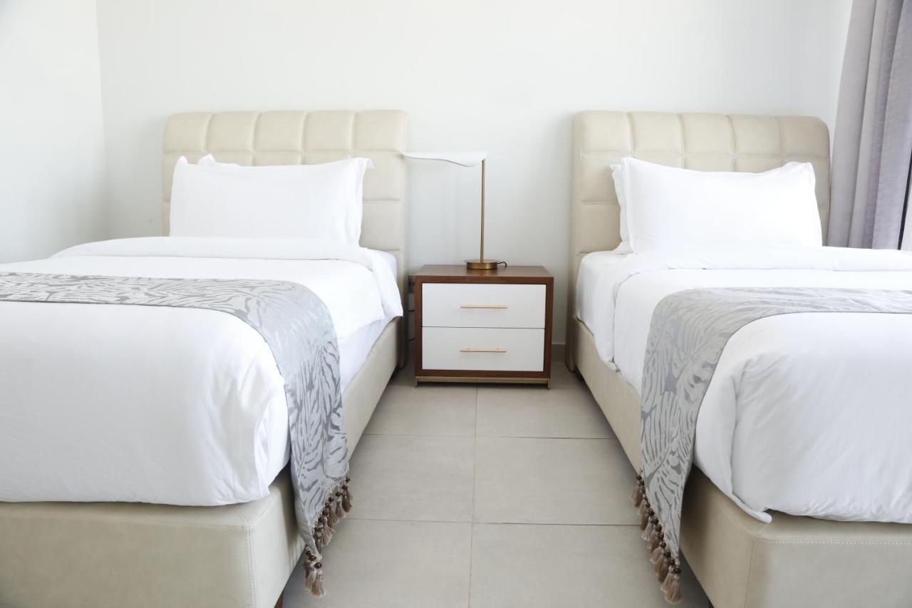 Waterfront Hotel Apartment Lusail Exterior photo Two beds